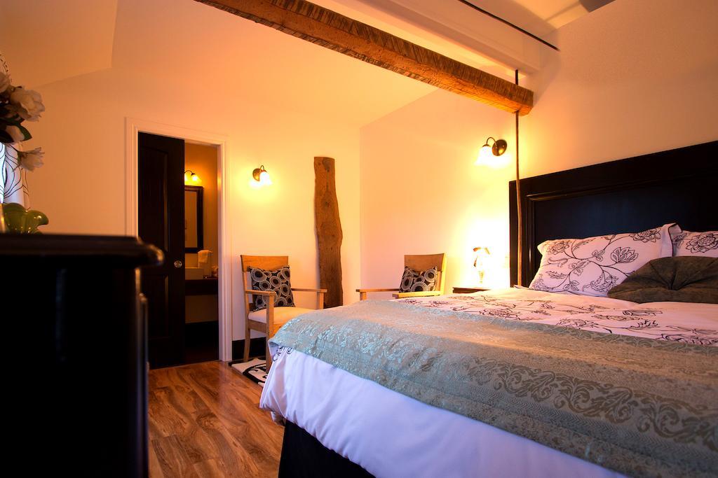 Les Ancetres Auberge & Restaurant St-Pierre-de-l'Île-d'Orléans Стая снимка